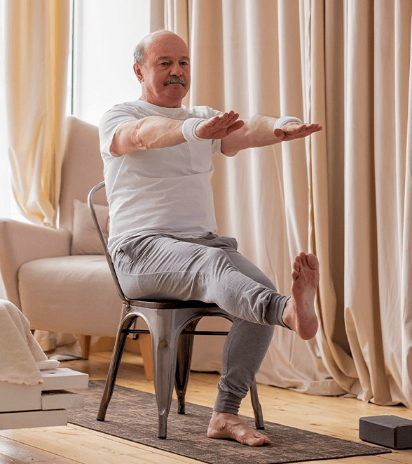 The 10-Minute Chair Yoga Routine Your Parent Can Start This Week